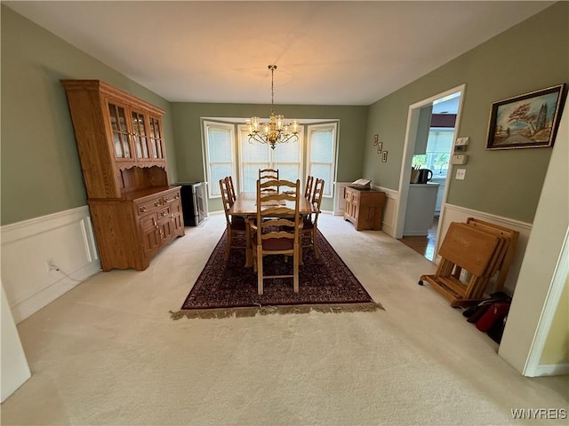 26 Forestglen Cir, Amherst, NY 14221 - dining space with a chandelier and light colored carpet