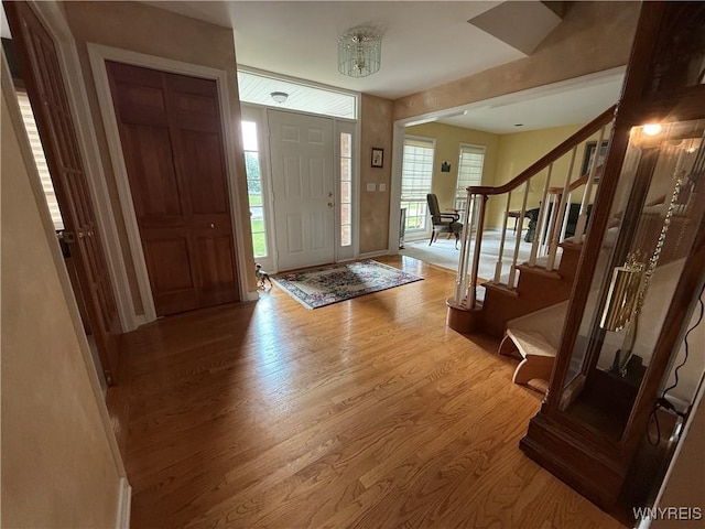 26 Forestglen Cir, Amherst, NY 14221 - foyer entrance with stairs and light wood-type flooring