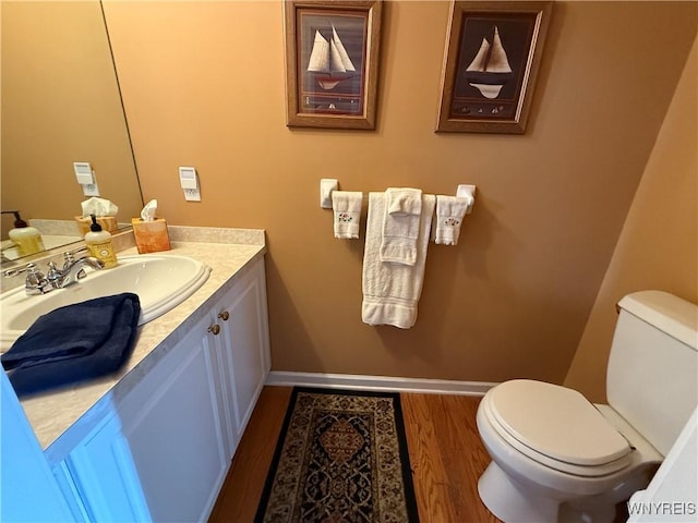 26 Forestglen Cir, Amherst, NY 14221 - half bath with vanity and wood finished floors