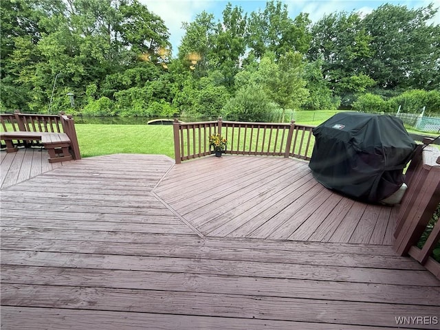 26 Forestglen Cir, Amherst, NY 14221 - wooden terrace featuring a fenced backyard, view of wooded area, and area for grilling
