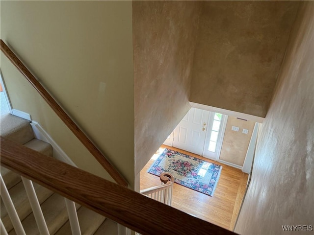 26 Forestglen Cir, Amherst, NY 14221 - stairs featuring wood finished floors and baseboards