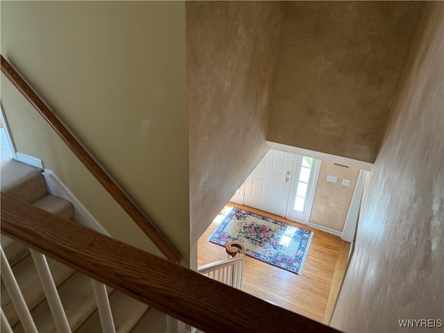 26 Forestglen Cir, Amherst, NY 14221 - staircase with wood finished floors and baseboards