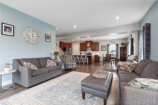 2600 Sunshine Cir, Camillus, NY 13031 - living area featuring dark wood finished floors, stairs, and recessed lighting