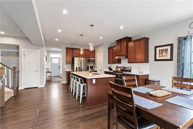 2600 Sunshine Cir, Camillus, NY 13031 - dining space with dark wood-type flooring, stairway, and recessed lighting