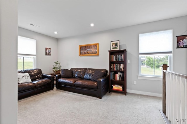 2600 Sunshine Cir, Camillus, NY 13031 - living room featuring light carpet, plenty of natural light, and recessed lighting