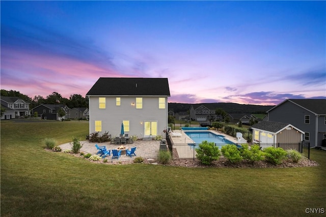 2600 Sunshine Cir, Camillus, NY 13031 - back of property at dusk with a patio area