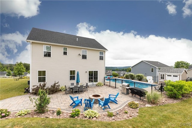 2600 Sunshine Cir, Camillus, NY 13031 - back of property featuring a fire pit and a patio
