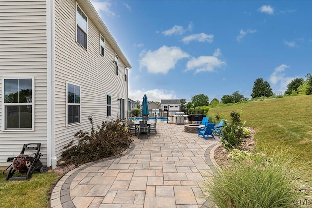 2600 Sunshine Cir, Camillus, NY 13031 - view of patio / terrace featuring an outdoor fire pit