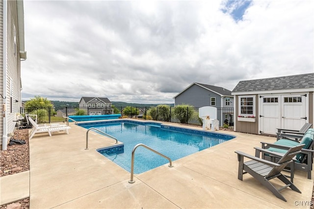 2600 Sunshine Cir, Camillus, NY 13031 - view of pool with a patio area and a storage shed