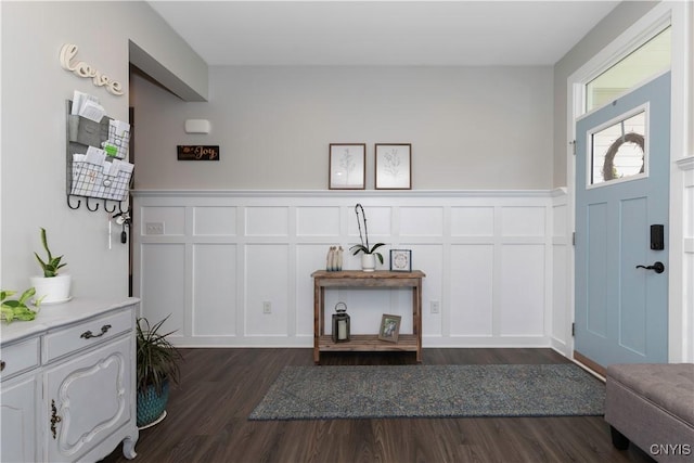 2600 Sunshine Cir, Camillus, NY 13031 - entrance foyer with a decorative wall, dark wood-style floors, and wainscoting