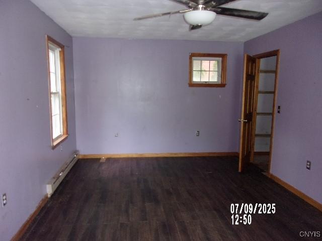 20 N 4th Ave, German Flatts, NY 13357 - spare room with ceiling fan, a baseboard heating unit, and wood finished floors