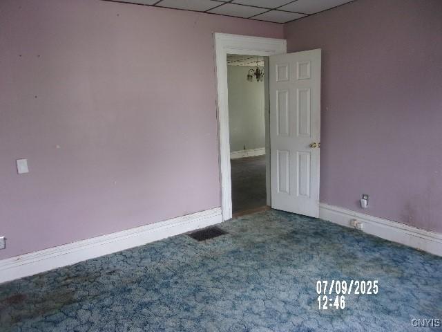 20 N 4th Ave, German Flatts, NY 13357 - carpeted spare room featuring a drop ceiling and baseboards