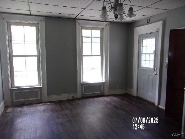 20 N 4th Ave, German Flatts, NY 13357 - entryway with a chandelier, a drop ceiling, healthy amount of natural light, and dark wood-type flooring