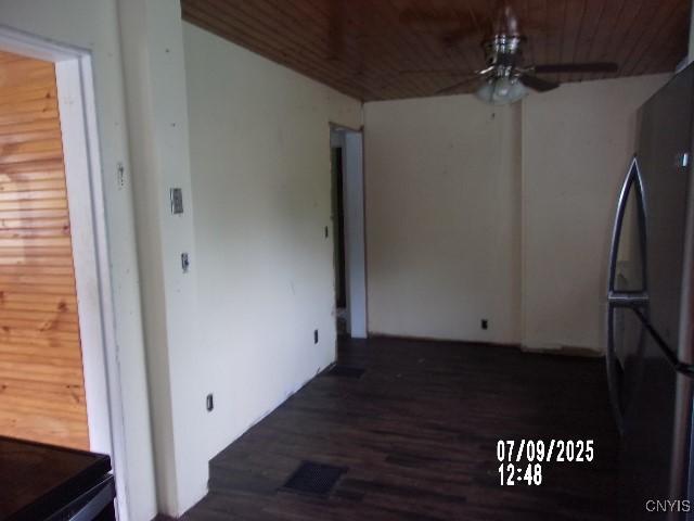20 N 4th Ave, German Flatts, NY 13357 - kitchen featuring freestanding refrigerator, ceiling fan, and dark wood-type flooring