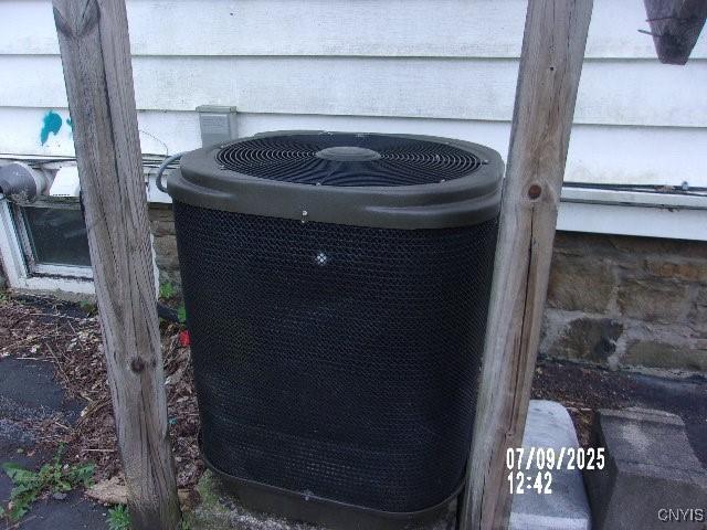 20 N 4th Ave, German Flatts, NY 13357 - exterior view of a central air condition unit and crawl space