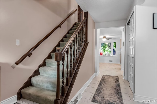 112 Creekview Dr, West Seneca, NY 14224 - staircase with tile patterned floors and ceiling fan