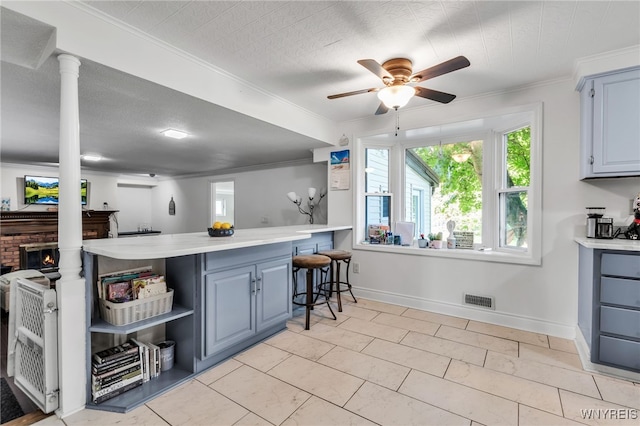 112 Creekview Dr, West Seneca, NY 14224 - kitchen with light countertops, ceiling fan, a peninsula, ornamental molding, and open shelves