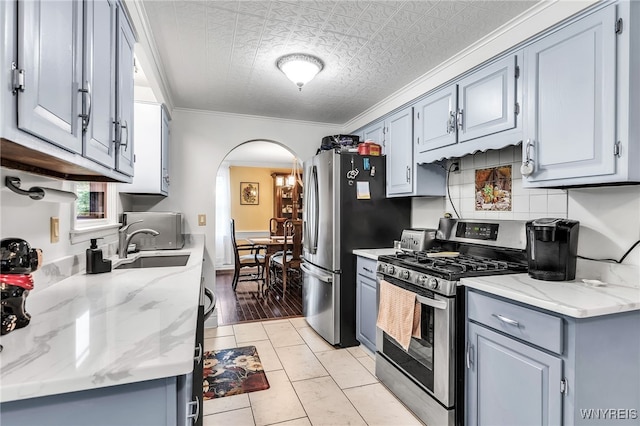 112 Creekview Dr, West Seneca, NY 14224 - kitchen featuring stainless steel appliances, arched walkways, gray cabinets, ornamental molding, and an ornate ceiling