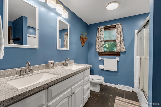 112 Creekview Dr, West Seneca, NY 14224 - bathroom with a shower stall, double vanity, and tile patterned flooring