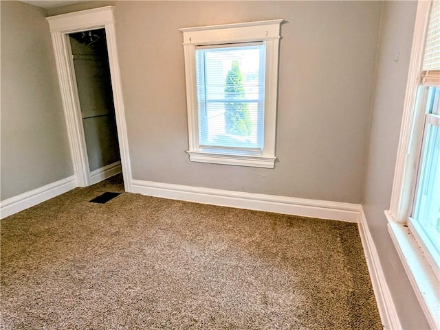 883 Brown Rd, Irondequoit, NY 14622 - carpeted empty room featuring baseboards