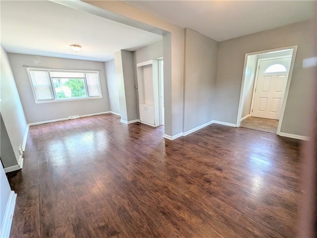 883 Brown Rd, Irondequoit, NY 14622 - spare room featuring dark wood finished floors and baseboards