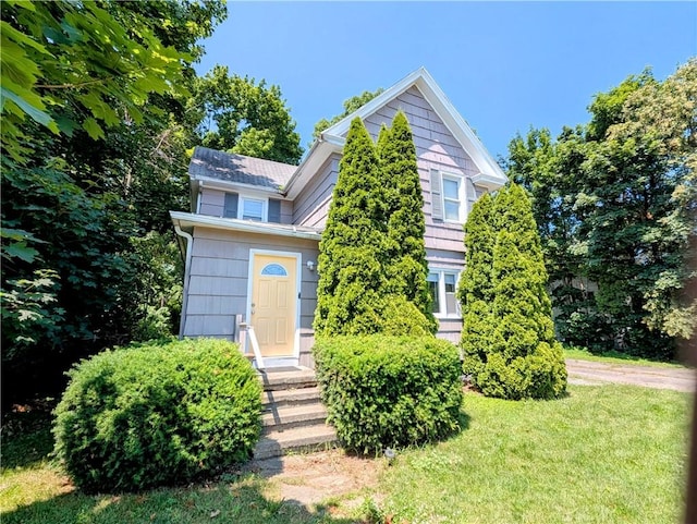 883 Brown Rd, Irondequoit, NY 14622 - view of property hidden behind natural elements with a front yard