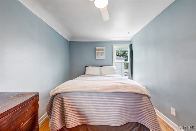 445 75th St, Niagara Falls, NY 14304 - bedroom featuring wood finished floors and a ceiling fan