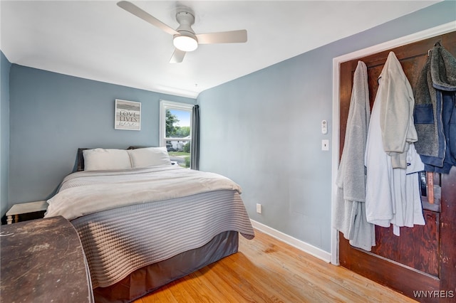 445 75th St, Niagara Falls, NY 14304 - bedroom featuring wood finished floors and ceiling fan