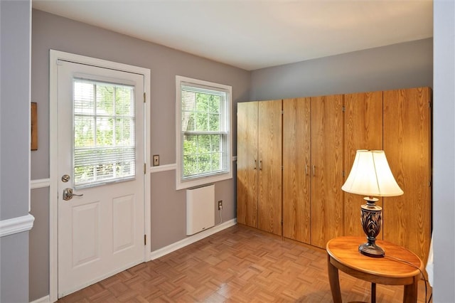 798 Hawthorne Pl, Webster, NY 14580 - doorway with radiator heating unit and baseboards