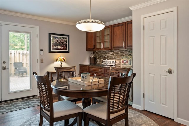 798 Hawthorne Pl, Webster, NY 14580 - dining space with dark wood-style flooring and crown molding