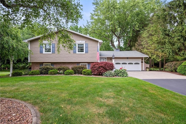 798 Hawthorne Pl, Webster, NY 14580 - split level home with a garage, driveway, and a front lawn