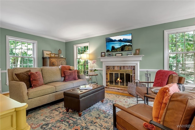 29 Cherry Tree Ln, Orchard Park, NY 14127 - living area with ornamental molding, a fireplace, and wood finished floors
