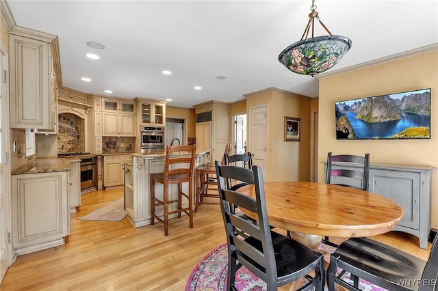 29 Cherry Tree Ln, Orchard Park, NY 14127 - dining room with ornamental molding, light wood-type flooring, and recessed lighting