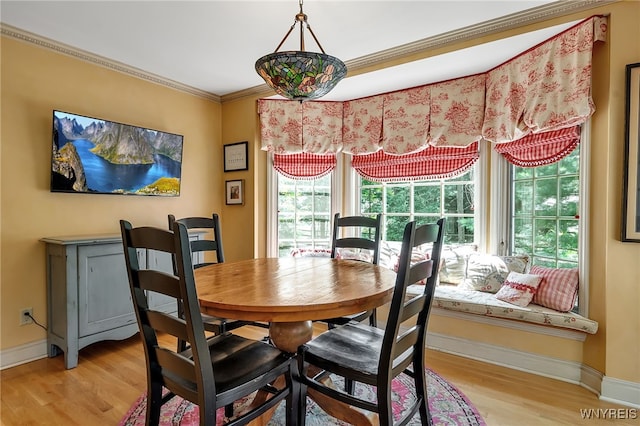 29 Cherry Tree Ln, Orchard Park, NY 14127 - dining area with light wood-style floors and ornamental molding