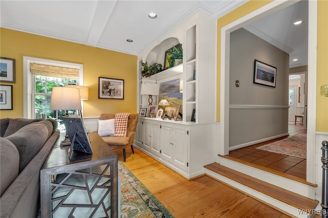 29 Cherry Tree Ln, Orchard Park, NY 14127 - living room featuring light wood-style flooring, ornamental molding, recessed lighting, and built in shelves