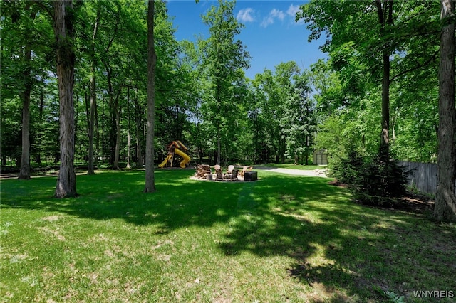 29 Cherry Tree Ln, Orchard Park, NY 14127 - view of yard featuring a playground and a storage unit