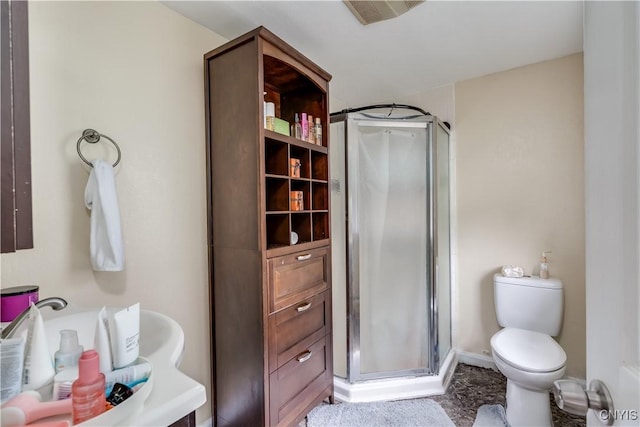 210 N James St, Wilna, NY 13619 - full bathroom featuring a shower stall and toilet