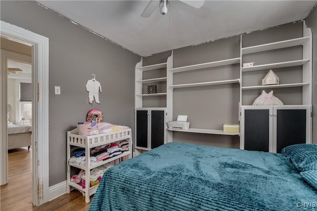 210 N James St, Wilna, NY 13619 - bedroom with wood finished floors and a ceiling fan