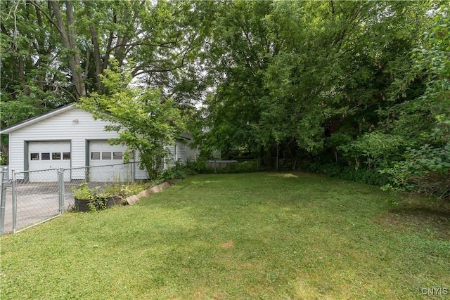 210 N James St, Wilna, NY 13619 - view of yard featuring a garage and an outbuilding