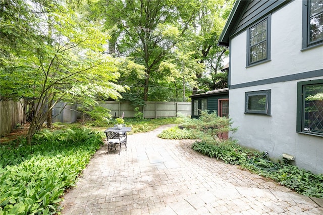 8 Oak Ln, Brighton, NY 14610 - fenced backyard with a patio