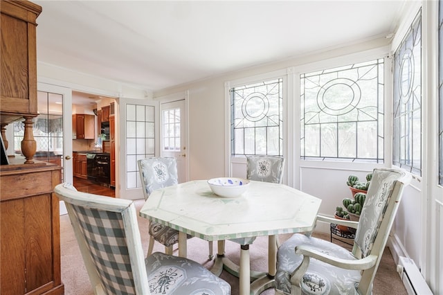 8 Oak Ln, Brighton, NY 14610 - carpeted dining area featuring a baseboard radiator