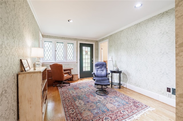 8 Oak Ln, Brighton, NY 14610 - living area featuring wallpapered walls, wood finished floors, and ornamental molding