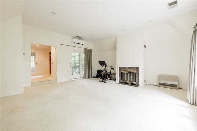 8 Oak Ln, Brighton, NY 14610 - living room featuring carpet, a premium fireplace, lofted ceiling, an AC wall unit, and recessed lighting