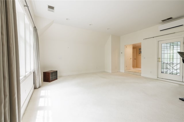 8 Oak Ln, Brighton, NY 14610 - spare room featuring light carpet and a wall mounted air conditioner