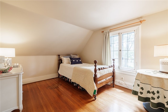 8 Oak Ln, Brighton, NY 14610 - bedroom with wood finished floors and lofted ceiling