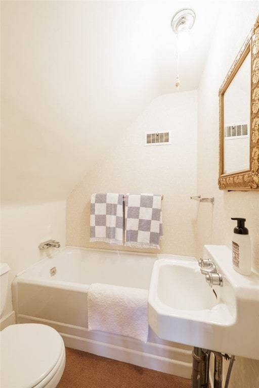 8 Oak Ln, Brighton, NY 14610 - full bathroom featuring vaulted ceiling and a bathtub