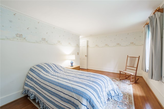 8 Oak Ln, Brighton, NY 14610 - bedroom featuring wood finished floors and wallpapered walls