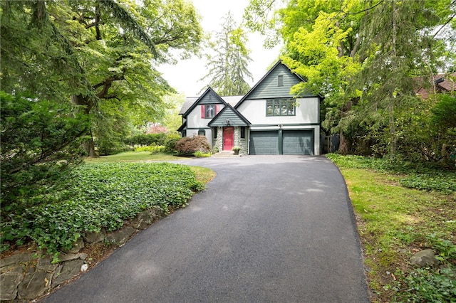 8 Oak Ln, Brighton, NY 14610 - view of front of property featuring asphalt driveway