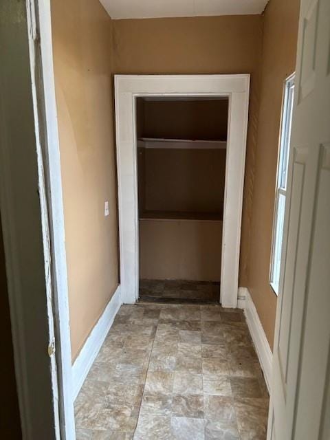 524-526 Dewey Ave, Rochester, NY 14613 - corridor featuring baseboards and stone finish flooring
