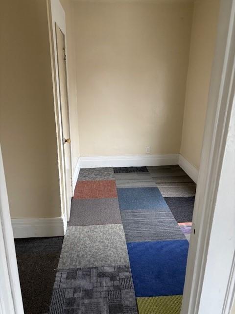 524-526 Dewey Ave, Rochester, NY 14613 - unfurnished room with baseboards